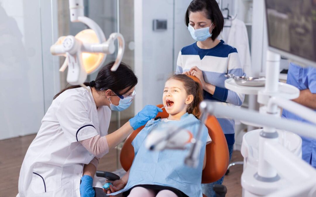 What are the signs that a child needs treatment from the Best Pedodontist Dentist in Siliguri?